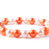 7" Orange and white freshwater pearl bracelet