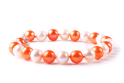 7" Orange and white freshwater pearl bracelet