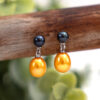 Yellow and black freshwater pearl earrings.