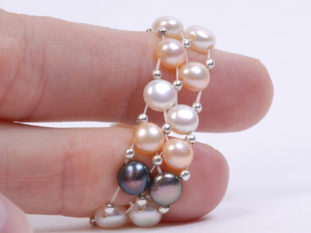 Green and White Freshwater Button Pearl Elastic Ring - Image 2