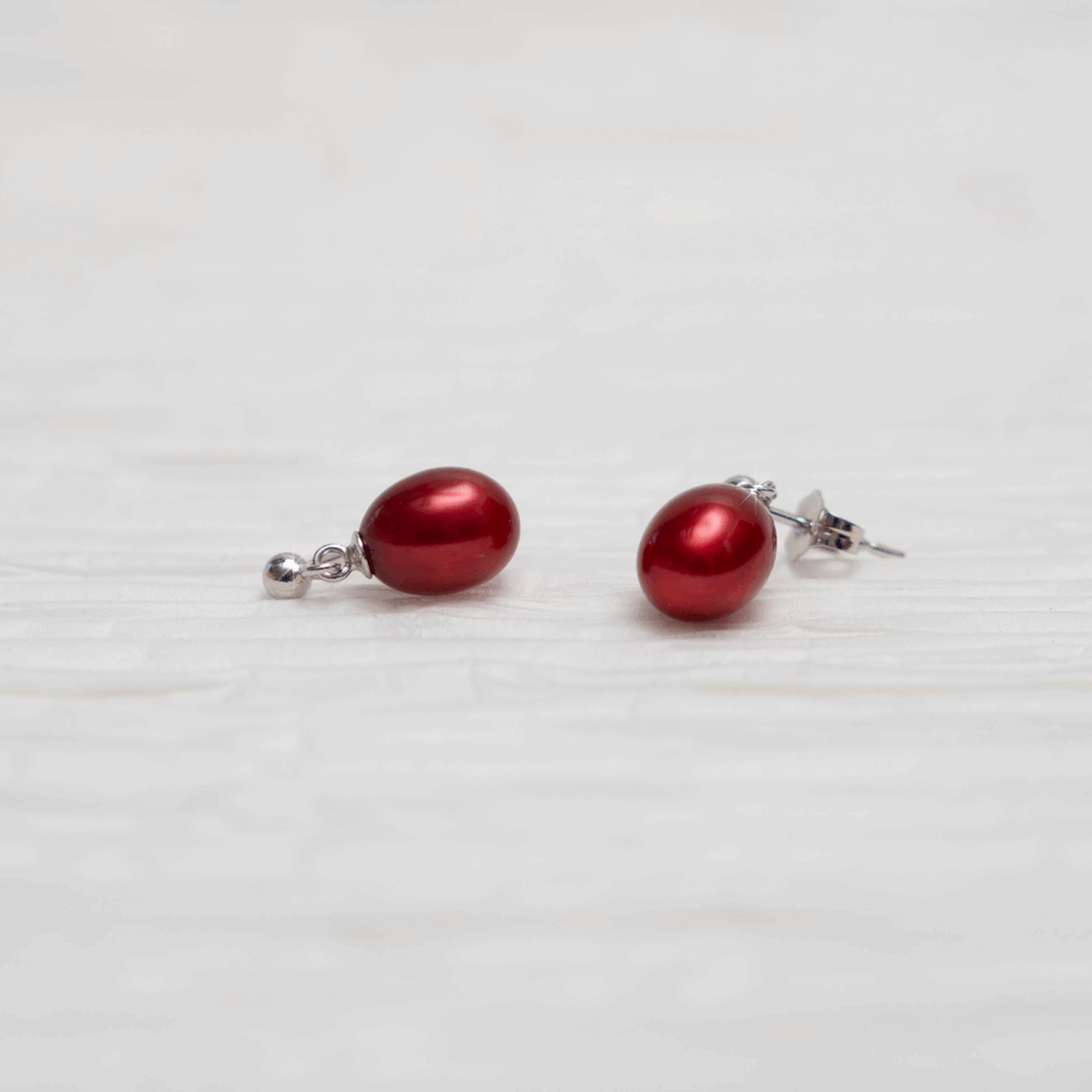 Crimson red pearl earrings with silver posts