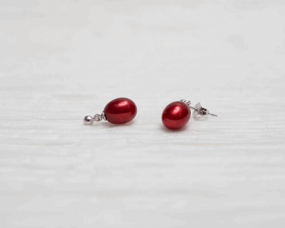 Crimson red pearl earrings with silver posts
